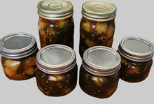 Cowgirl Candy (pickled Jalapeños and pineapple)