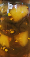 Cowgirl Candy (pickled Jalapeños and pineapple)